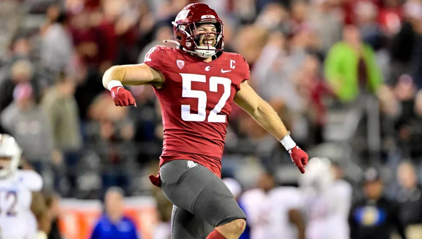 Washington State Cougars linebacker Kyle Thornton (52) celebrates intercepting a San Jose State Spartans pass during the second half of a college football game on Friday at Gesa Field in Pullman, Wash. WSU won the game 54-52 in overtime. (Tyler Tjomsland/McClatchy News Service)