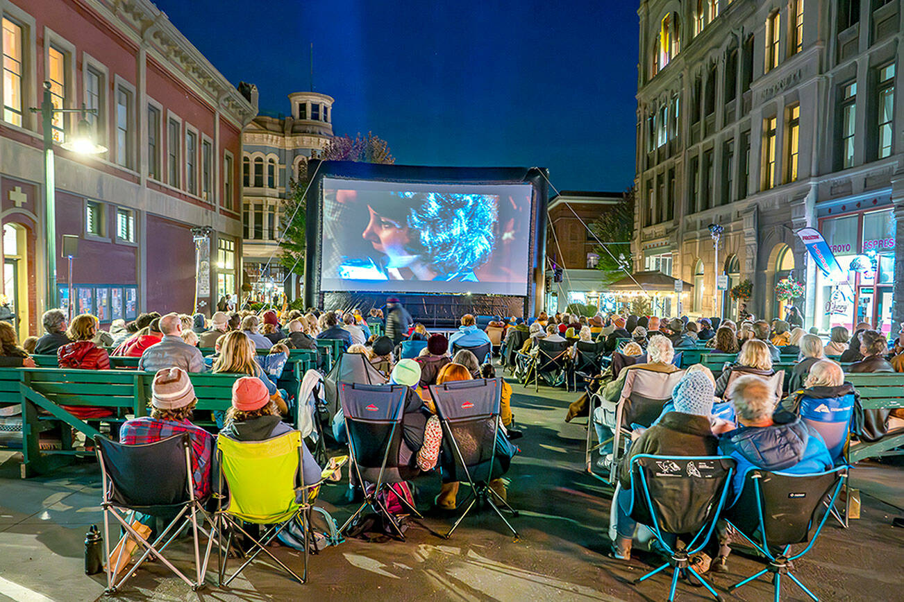 Film buffs enjoy a free presentation during the 25th Port Townsend Film Festival on Saturday. The feature was the 1973 classic “American Graffiti” about teenage life in 1962 California. (Steve Mullensky/for Peninsula Daily News)