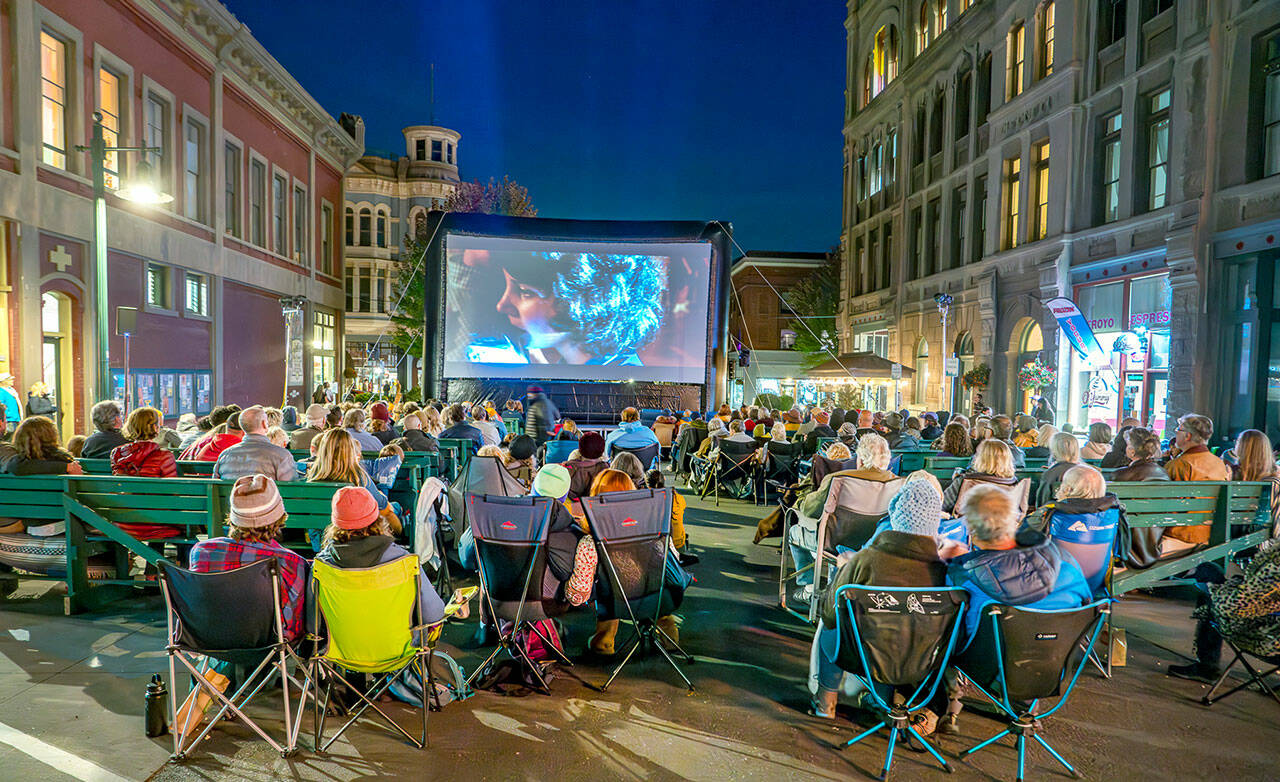 Film buffs enjoy a free presentation during the 25th Port Townsend Film Festival on Saturday. The feature was the 1973 classic “American Graffiti” about teenage life in 1962 California. (Steve Mullensky/for Peninsula Daily News)