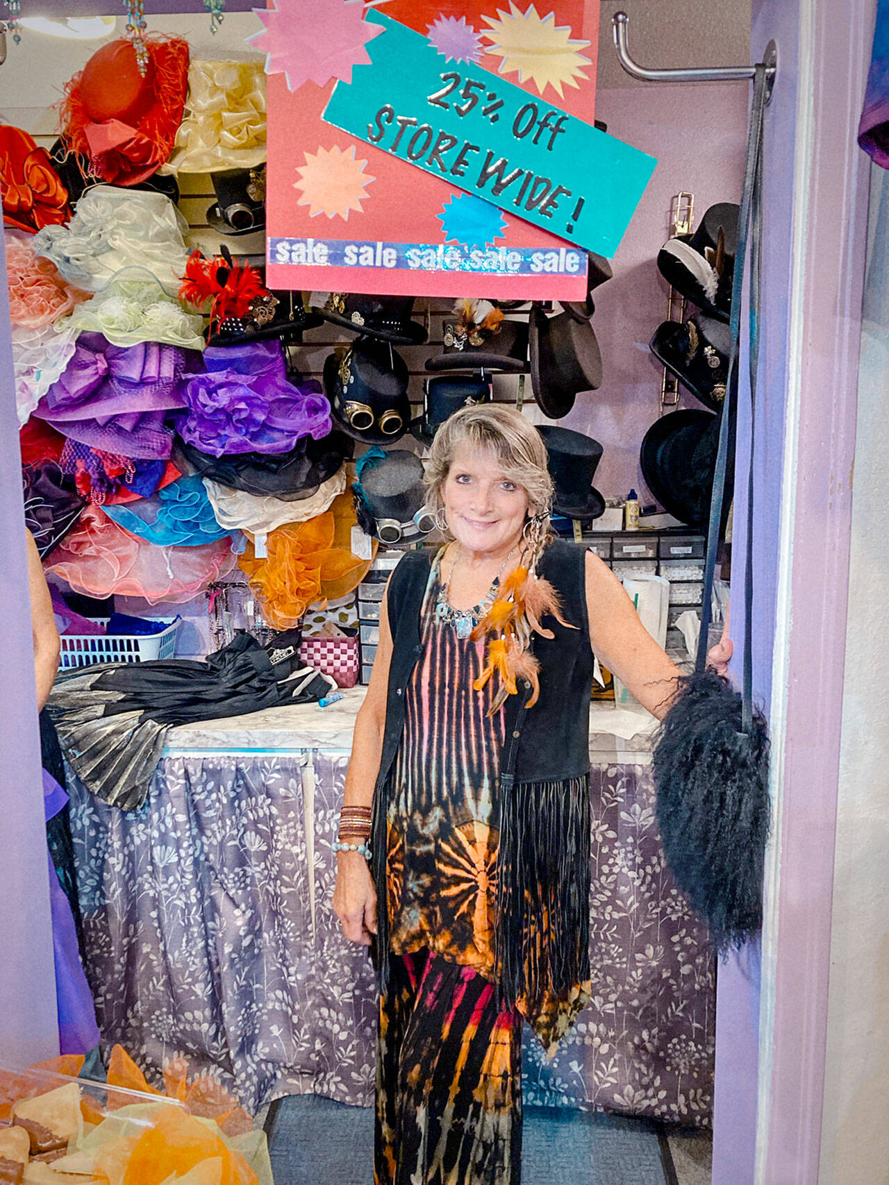 Denise Arey, owner of Expressions at 834 Water St. in Port Townsend, celebrates Girls’ Night Out during the 2023 event.