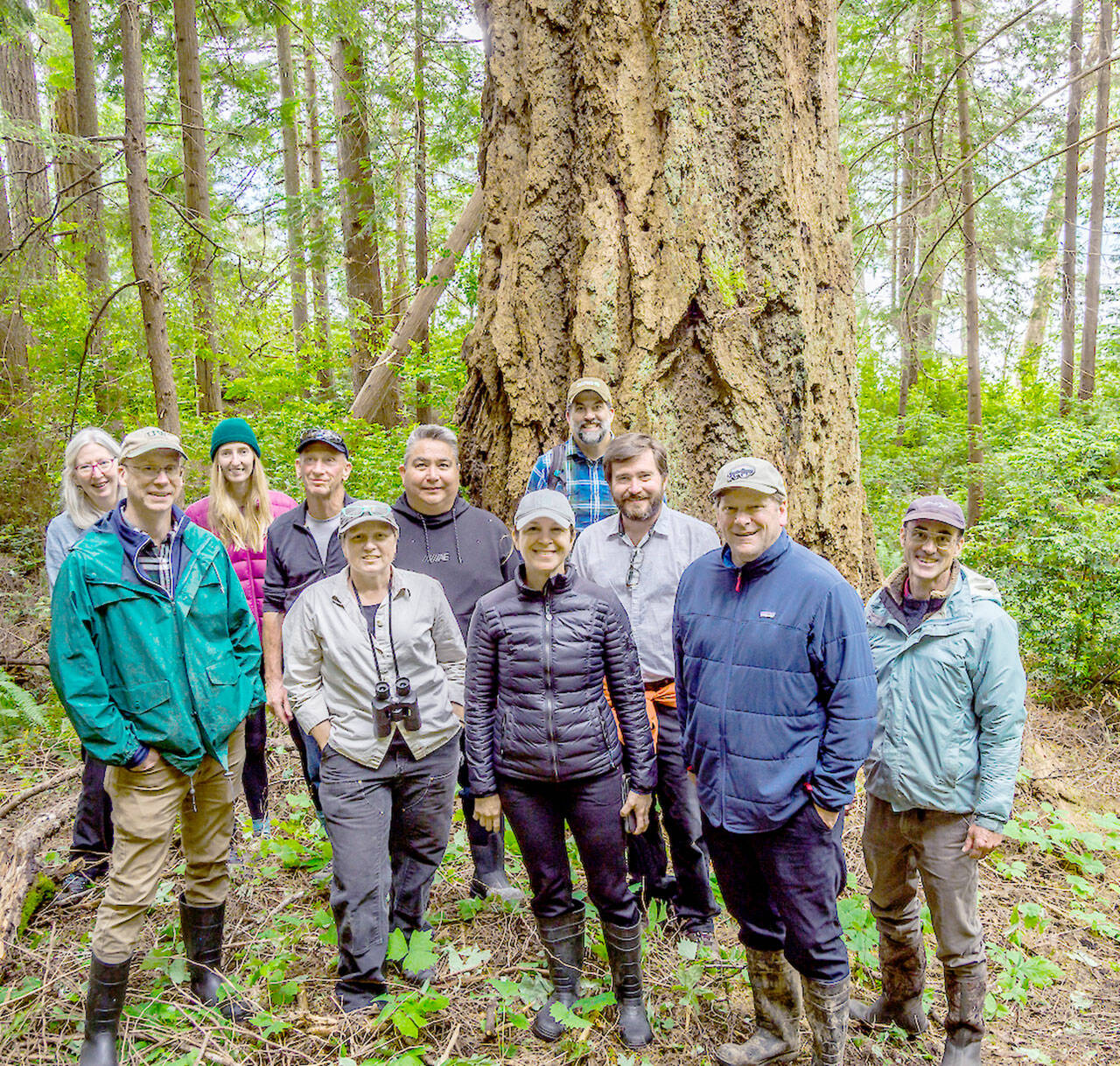 State and local officials toured Dabob Bay forests in 2022. Back row, left to right, Mary Jean Ryan of Quilcene; Rachel Bollens; Bill Taylor, Taylor Shellfish Co.; Jeromy Sullivan, Port Gamble S’Klallam Tribe; Justin Allegro, The Nature Conservancy; and Greg Brotherton, Jefferson County Commissioner. Front row, left to right, Duane Emmons, DNR staff; Jean Ball of Quilcene; Hilary Franz, state Commissioner of Public Lands; Mike Chapman, state Representative; and Peter Bahls, director of Northwest Watershed Institute. (Keith Lazelle)