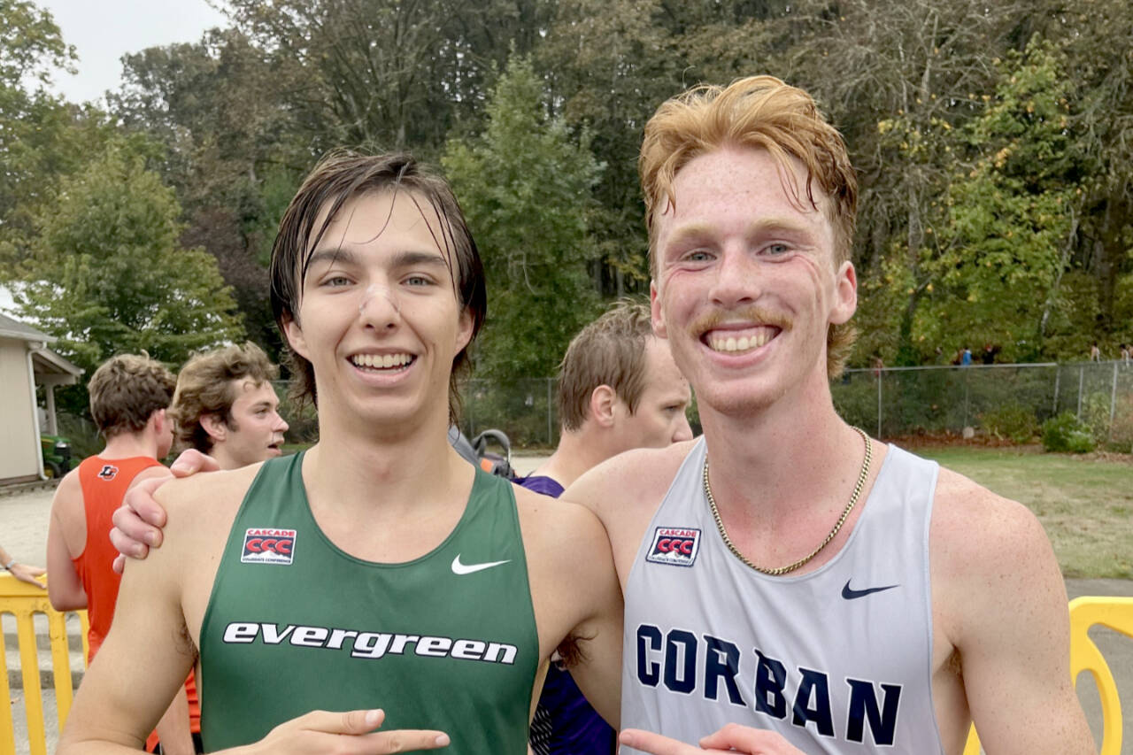 Former Port Angeles cross-country teammates Max Baeder, left, and Jack Gladfelter competed against each other at the Charles Bowles 8K Cross-Country Invitational in Salem, Ore., this weekend. Baeder runs for The Evergreen State college while Gladfelter runs for Corban University in Salem. (Joe Gladfelter)