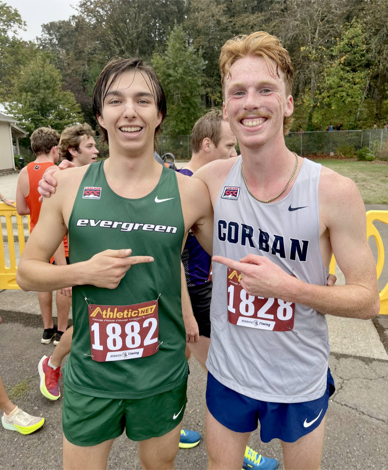 Former Port Angeles cross-country teammates Max Baeder, left, and Jack Gladfelter competed against each other at the Charles Bowles 8K Cross-Country Invitational in Salem, Ore., this weekend. Baeder runs for The Evergreen State college while Gladfelter runs for Corban University in Salem. (Joe Gladfelter)