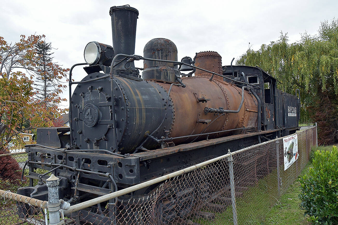 The Rayonier locomotive, known as “the 4,” located at the corner of Chase Street and Lauridsen Boulevard in Port Angeles, awaits restoration as a fundraising drive to renovate the engine and make improvements to the traffic triangle where the train is on display. (Keith Thorpe/Peninsula Daily News)