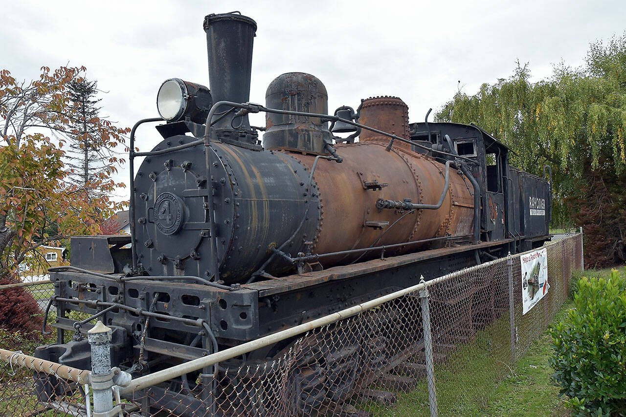 The Rayonier locomotive, known as “the 4,” located at the corner of Chase Street and Lauridsen Boulevard in Port Angeles, awaits restoration as a fundraising drive to renovate the engine and make improvements to the traffic triangle where the train is on display. (Keith Thorpe/Peninsula Daily News)