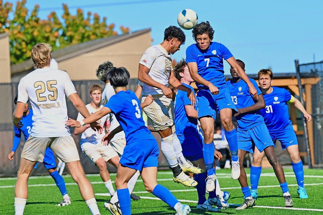 Peninsula College's  Jem Ndja  goes up for a header in a game Saturday at Wally Sigmar Field against Edmonds College. Peninsula won 7-0. (Jay Cline/Peninsula College)