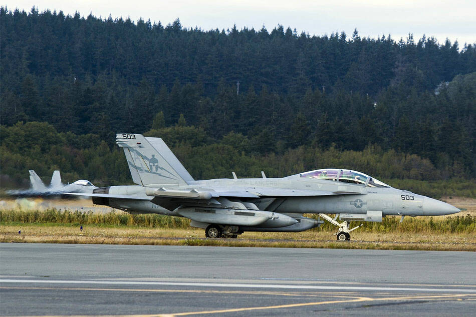 An EA-18G Growler taxis down the airstrip on Naval Air Station Whidbey Island during the squadron’s welcome home ceremony in August 2017. (Mass Communication Specialist 2nd Class Scott Wood/U.S. Navy)