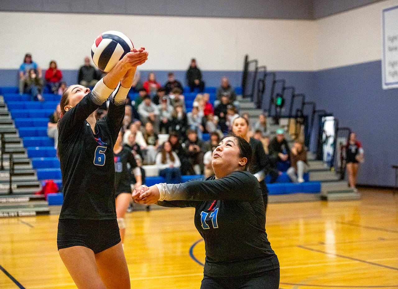 Steve Mullensky/for Peninsula Daily News East Jefferson Rivals Sophia Petta, left, and Stephanie Contreras Duran, both were after the ball during a hotly contested game against the Life Christian Eagles in Chimacum on Wednesday.