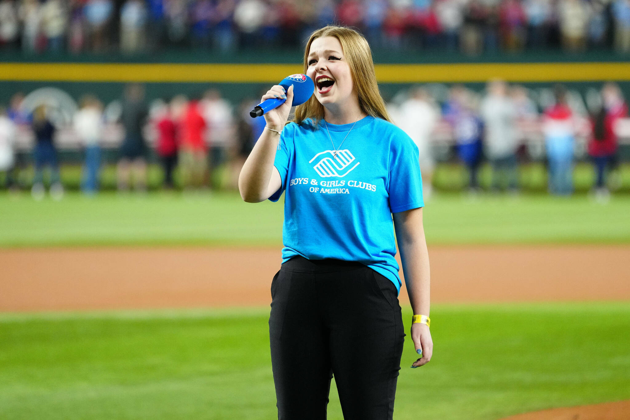 Boys & Girls Clubs Youth Performer Pearle Peterson of Sequim sings the national anthem prior to Game 2 of the 2023 World Series between the Arizona Diamondbacks and the Texas Rangers on Oct. 28 in Arlington, Texas. She will sing it again at the World Series in Los Angeles on Saturday. (Mary DeCicco/MLB Photos via Getty Images)