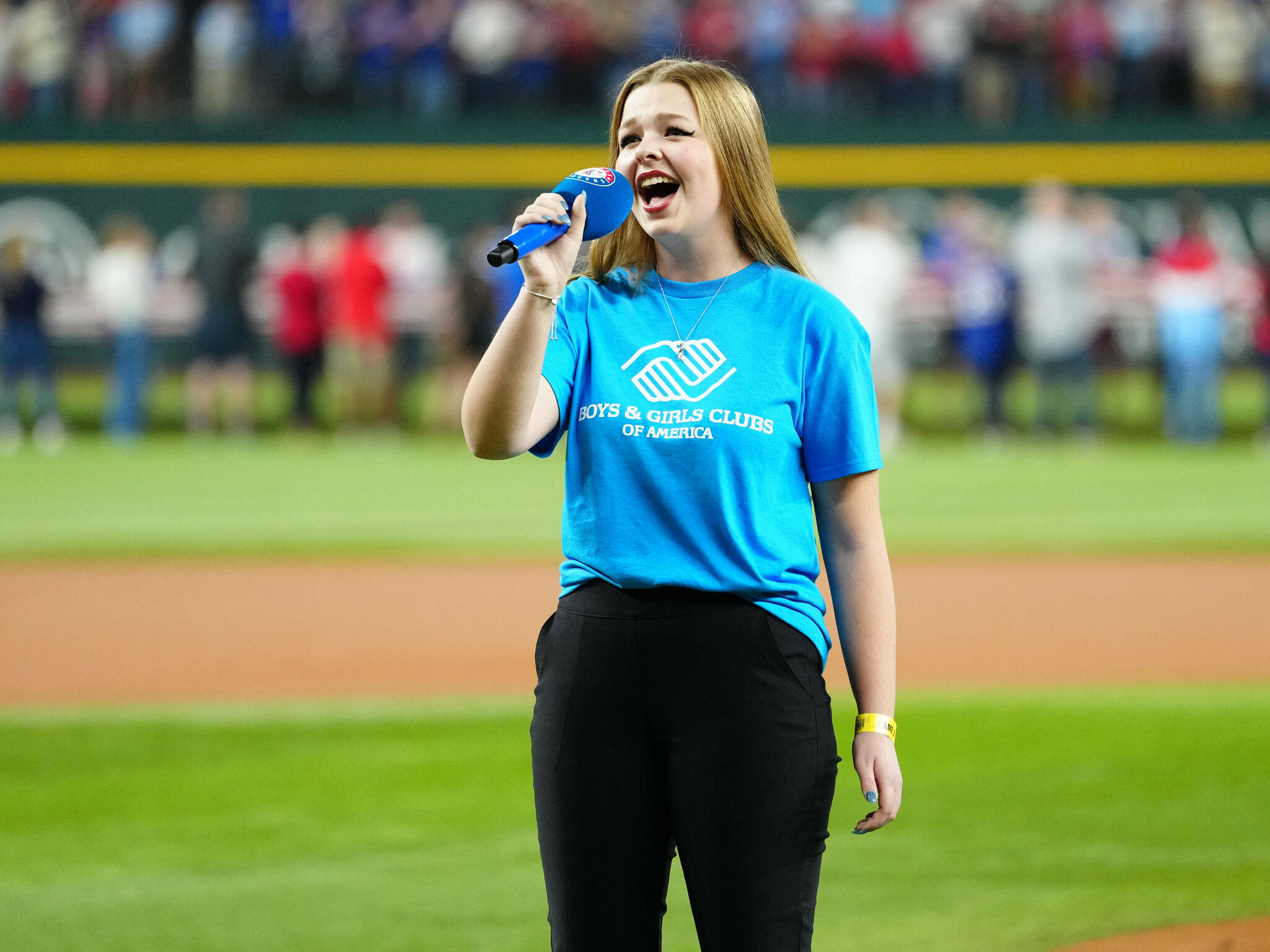 Boys & Girls Clubs Youth Performer Pearle Peterson of Sequim sings the national anthem prior to Game 2 of the 2023 World Series between the Arizona Diamondbacks and the Texas Rangers on Oct. 28 in Arlington, Texas. She will sing it again at the World Series in Los Angeles on Saturday. (Mary DeCicco/MLB Photos via Getty Images)