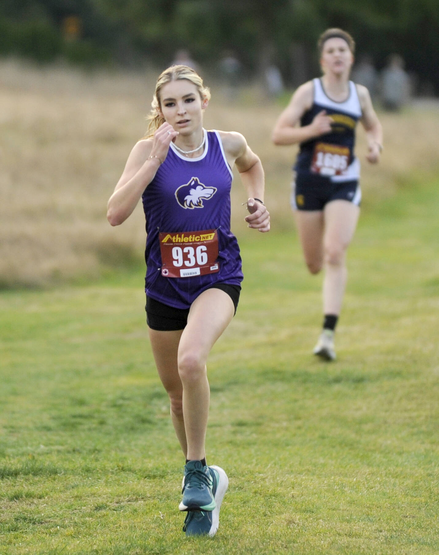 Michael Dashiell/Olympic Peninsula News Group
Sequim's Dawn Hulstedt, front, finished fourth at the Olympic League Cross Country Championships held Thursday at The Cedars at Dungeness Golf Course.