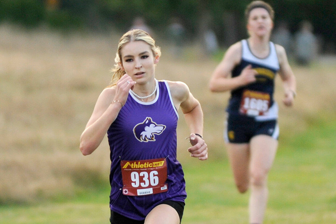 Michael Dashiell/Olympic Peninsula News Group
Sequim's Dawn Hulstedt, front, finished fourth at the Olympic League Cross Country Championships held Thursday at The Cedars at Dungeness Golf Course.