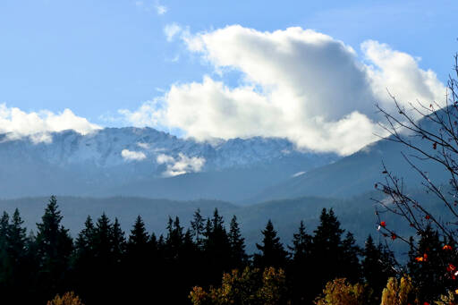 A recent snow is visible from Port Angeles on the Klahhane Ridge on Tuesday. The forecast for the rest of the week calls for high temperatures hovering about 50 degrees with a chance of showers and overnight lows in the low 40s. (Dave Logan/for Peninsula Daily News)