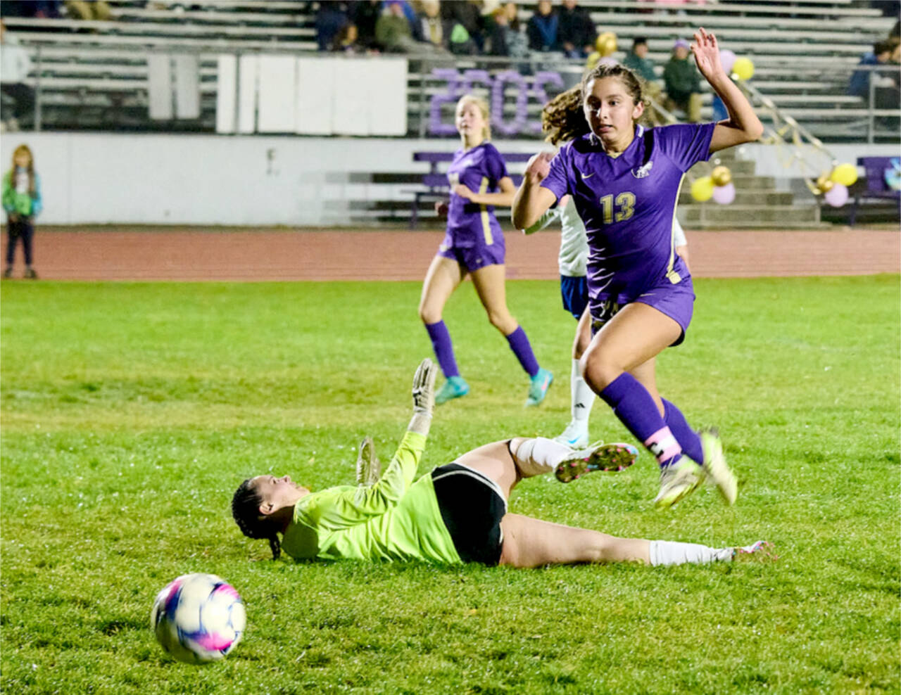 Sequim's Amara Gonzalez gets past the Bremerton keeper for a goal Tuesday night in Sequim. Gonzalez was one of seven Wolves who scored in a 13-1 win. (Courtesy of Daniel James)