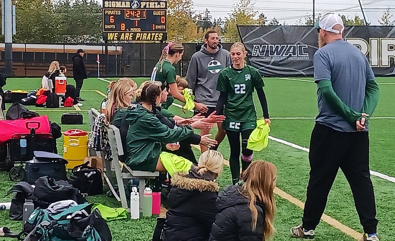 Port Angeles' Teanna Clark is congratulated by her teammates after she scored on a penalty kick against Franklin Pierce in the Roughriders' district playoff victory Saturday at Wally Sigmar Field. (Pierre LaBossiere/Peninsula Daily News)