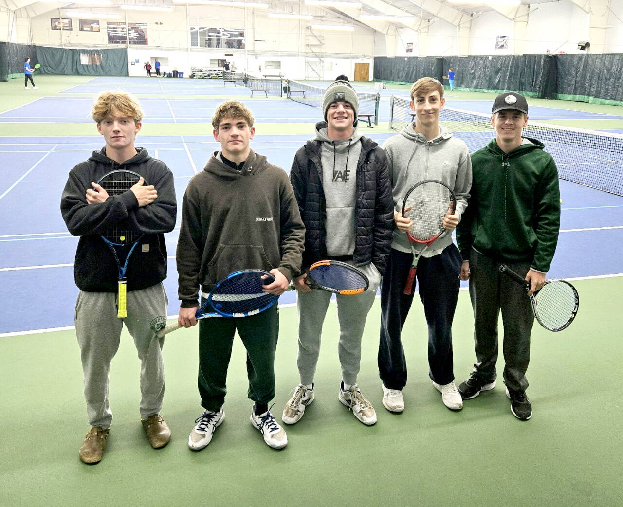 These Port Angeles boys tennis players qualified for the District 3 tournament. From left are  Tate Alton, Nathan Basden, Luke Flodstrom, Keatyn Hoch and Austin Worthington. Basden and Flodstrom won the district championship.