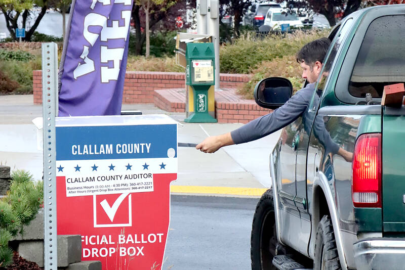 A man drops off his ballot this weekend in front of the Clallam County courthouse in Port Angeles. Dropboxes across Clallam and Jefferson counties will be open until 8 p.m. tonight. Go to www.peninsuladailynews.com for initial results. Election coverage will be in Thursday’s print edition. (Dave Logan/for Peninsula Daily News)