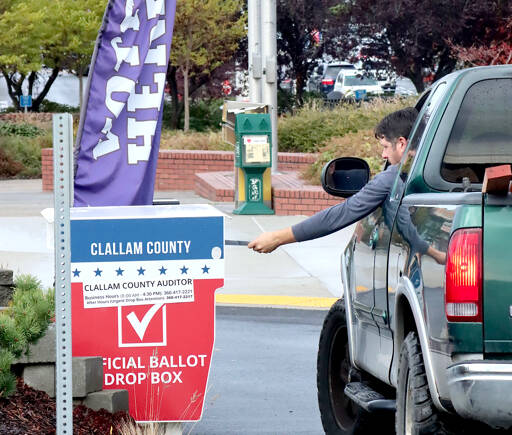 A man drops off his ballot this weekend in front of the Clallam County courthouse in Port Angeles. Dropboxes across Clallam and Jefferson counties will be open until 8 p.m. tonight. Go to www.peninsuladailynews.com for initial results. Election coverage will be in Thursday’s print edition. (Dave Logan/for Peninsula Daily News)