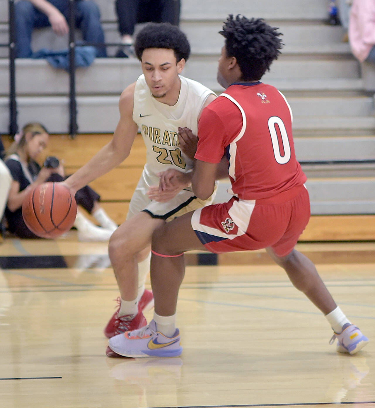 KEITH THORPE/PENINSULA DAILY NEWS
Peninsula's DeShawn Rushmeyer, left, shoulders into Skagit Valley's Mathew Russ on Wednesday at Peninsula College.