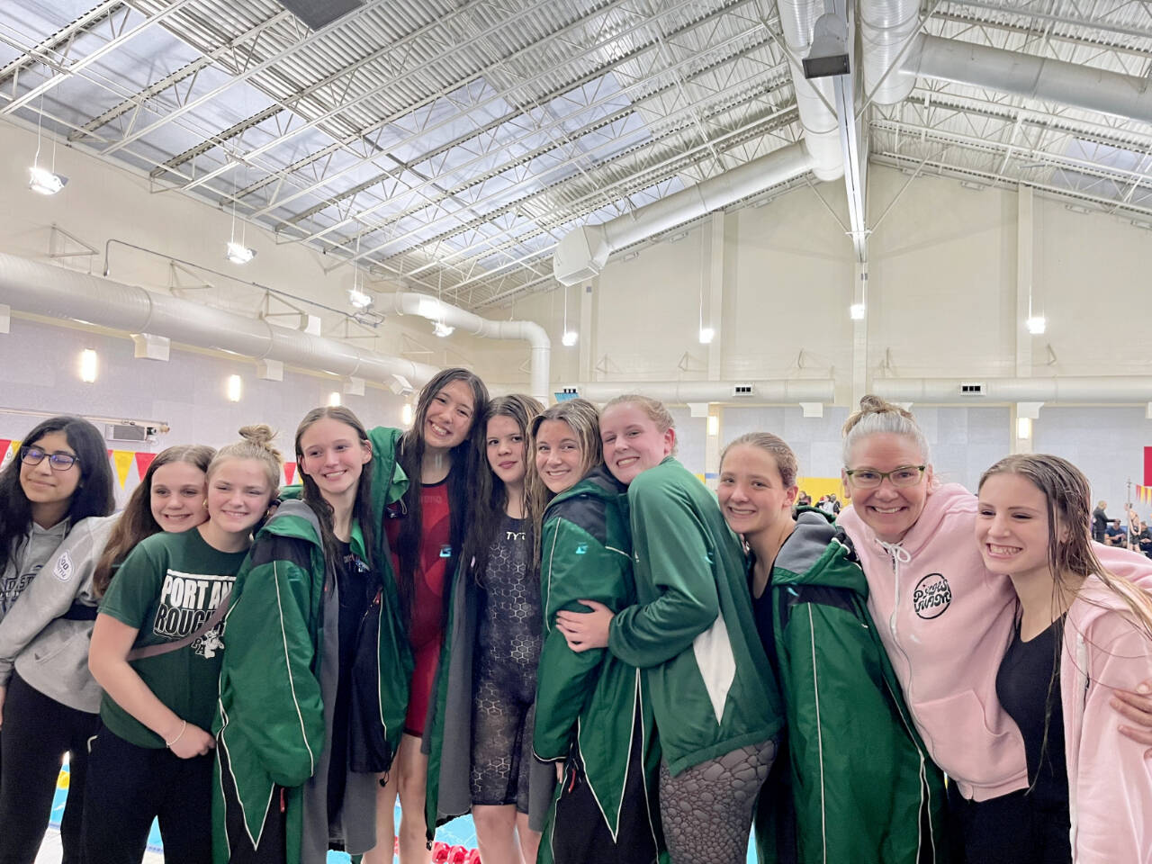 The Port Angeles girls swim team finished third at district with several swimmers moving on to state. Damun Seera, Lucy Townsend, Mia Francis, Lynzee Reid, Danika Asgiersson, Amayah Nelson, Brooke St. Luise, Emerson DuBois, Lizzy Shaw, coach Sally Cole and Chloe Kay-Sanders. (Port Angeles Swim Team)