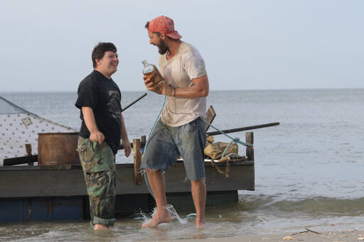 Zak (Zack Gottsagen) and Tyler (Shia Labeouf) near the raft they built together to travel by water. (Port Townsend Film Festival)