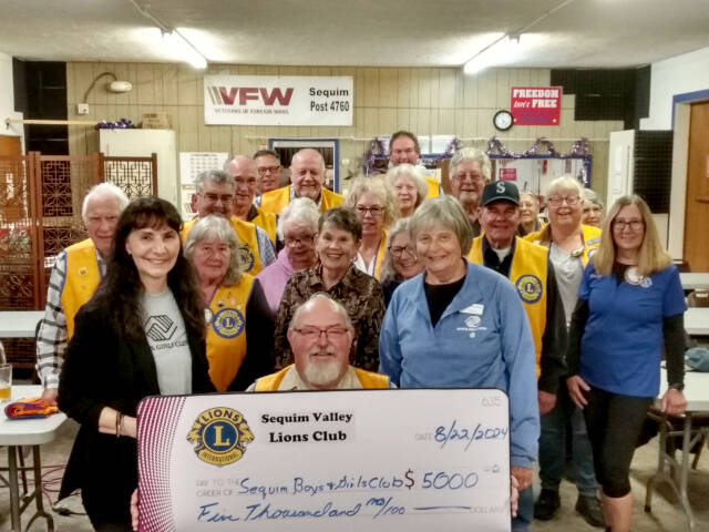 The Sequim Valley Lions Club donated $5,000 the Sequim Unit of the Boys Girls Clubs of the Olympic Peninsula.
Mary Budke, on left, and Norma Turner, on right, received the donation on behalf of the Boys Girls Clubs.