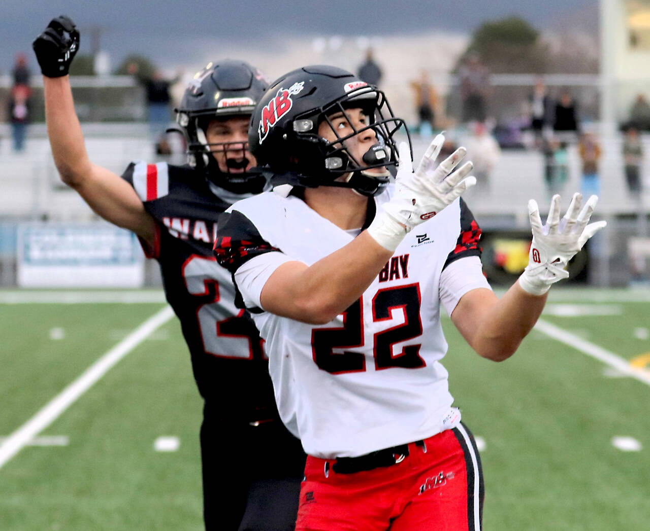 Neah Bay's Adan Ellis reaches for a pass against Almire-Coulee-Hartline in the state 1B quarterfinals Saturday played in Moses Lake. Ellis had four catches for 85 yards in the 14-12 loss. (Roger Harnack/Cheney Free Press)