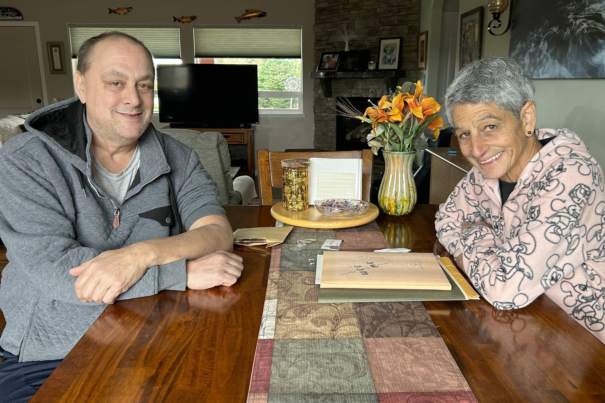 After learning about each other through a genealogy service 15 years ago and speaking on the phone for years, Steven Hanson of Montevideo, Minn., and Sue Harrison of Sequim met for the first time a few weeks ago. The siblings were placed for adoption by their biological mother about 10 years apart. (Matthew Nash/Olympic Peninsula News Group)