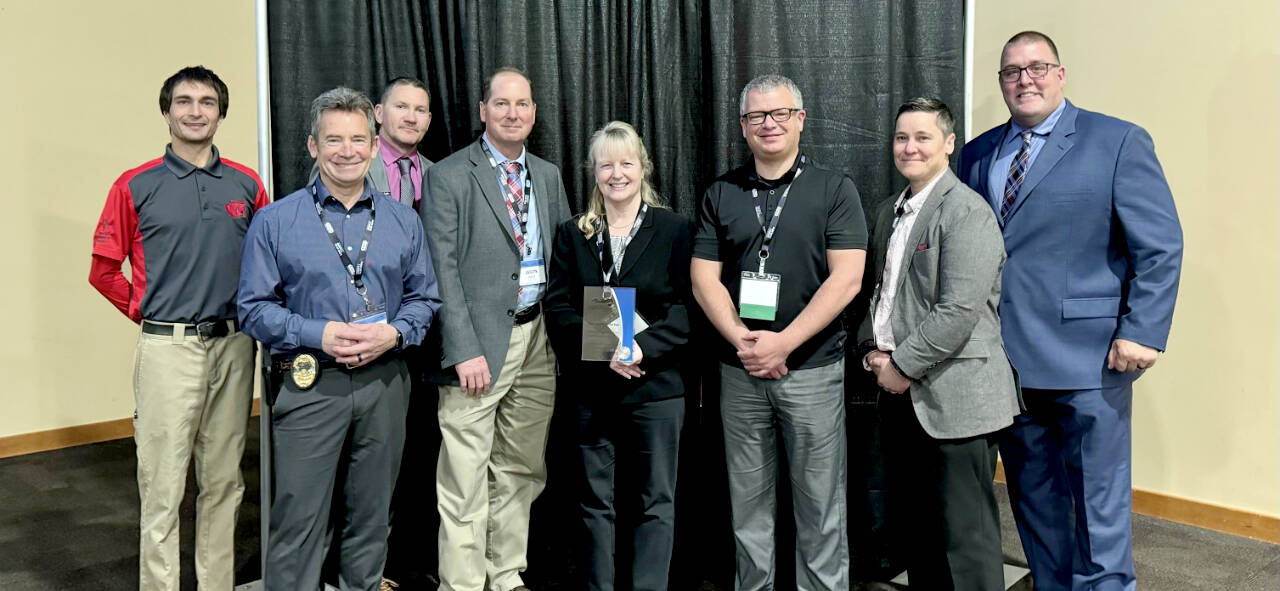 From left to right: Special Olympics Washington Athlete, Port Angeles Police Chief Brian Smith, East Wenatchee Police Officer Brandon Johnson, Port Angeles Deputy Chief Jason Viada, Undersheriff Lorraine Shore, Sheriff Brian King, Chief Criminal Deputy Amy Bundy and Fife Police Officer Patrick Gilbert. (Clallam County Sheriff’s Office via Facebook)