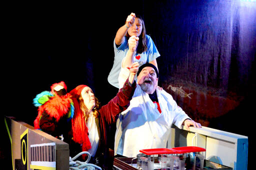 In “Bake to Alaska,” gingerbread contest entrants Patty (Kirsten Louise Webb, left), Sam (Eleanor Curtis) and Wolf (Paul Kiernan) sail toward the Last Frontier. The new holiday show is premiering this month at Key City Public Theatre in Port Townsend. (Diane Urbani de la Paz/For Peninsula Daily News)