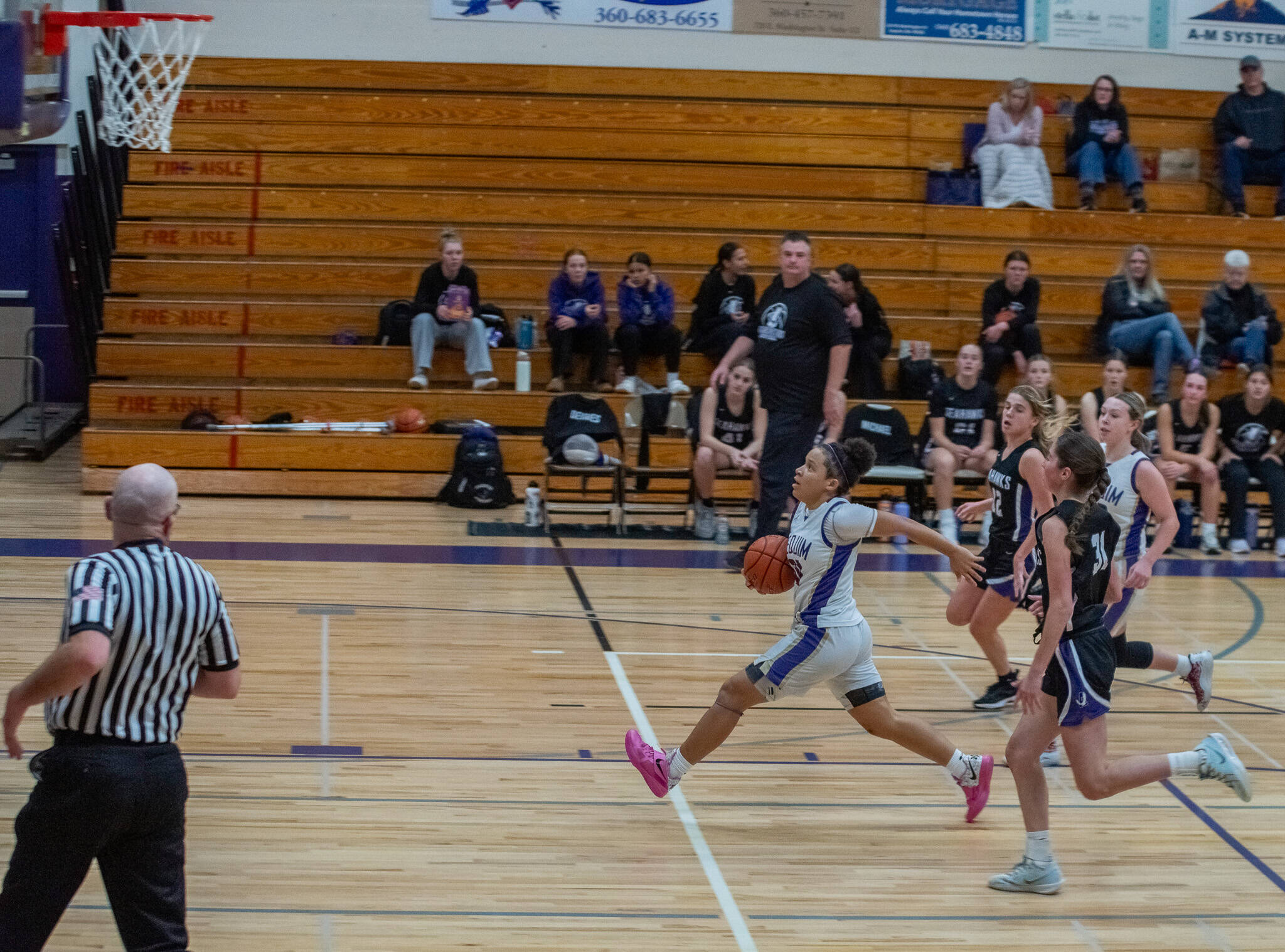 Emily Matthiessen/Olympic Peninsula News Group Sequim’s Bobbi Mixon goes up for a layup attempt during the Wolves’ season-opening 50-30 loss to Anacortes on Wednesday.