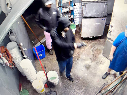 Surveillance footage released by the Clallam County Sheriff’s Office shows a suspect allegedly holding a Frugals employee at gunpoint on Thursday. (Clallam County Sheriff’s Office)