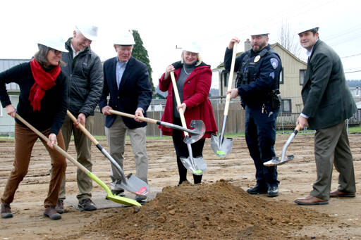 From left to right, donors Ann Soule and Dave Shreffler, Clallam County commissioner Randy Johnson, Peninsula Behavioral Health (PBH) CEO Wendy Sisk, PBH Board President Dave Arand and Port Angeles City Manager Nathan West break ground for PBH’s new housing project, North View. Once completed next December, North View will have 36 units available to provide permanent, supportive housing for those who have experienced chronic homelessness. (Emma Maple/Peninsula Daily News)