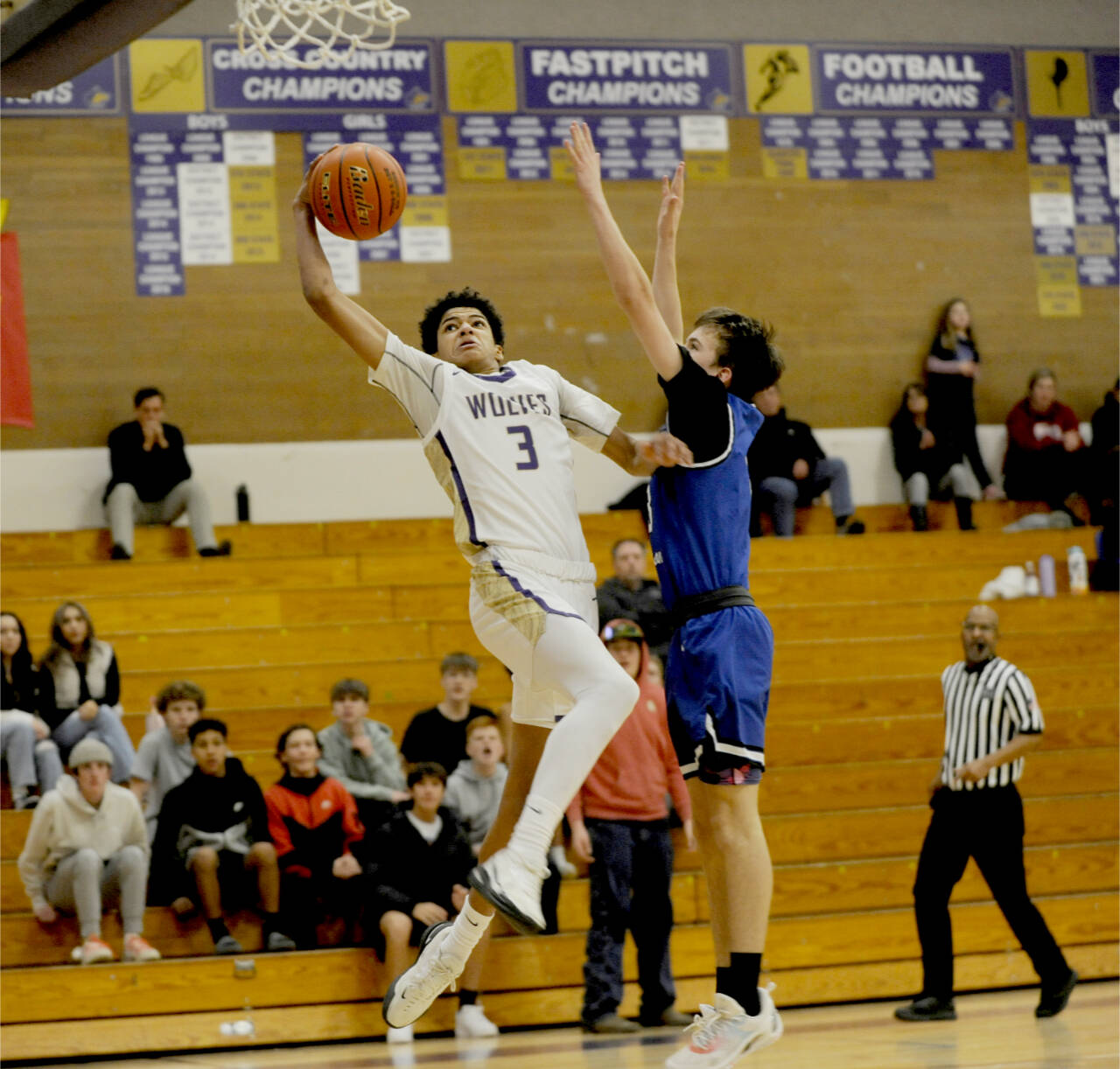 Sequim’s Solomon Sheppard attacks the rim during a 2023-24 contest against North Mason. (Michael Dashiell/Olympic Peninsula News Group)