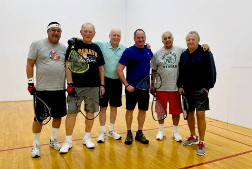 Every morning at 6, six local men are on the racquetball courts of the Port Angeles YMCA. The players — from left, Henry Pimentel, 70, Roy Gotham, 79, Carl Gay, 74, Todd German, 58, Frank Burke, 76, and Jerry Allen, 69 — say the friendly games are good for cardio and camaraderie. Gotham and Gay have been playing together for more than 40 years. (Paula Hunt/Peninsula Daily News)