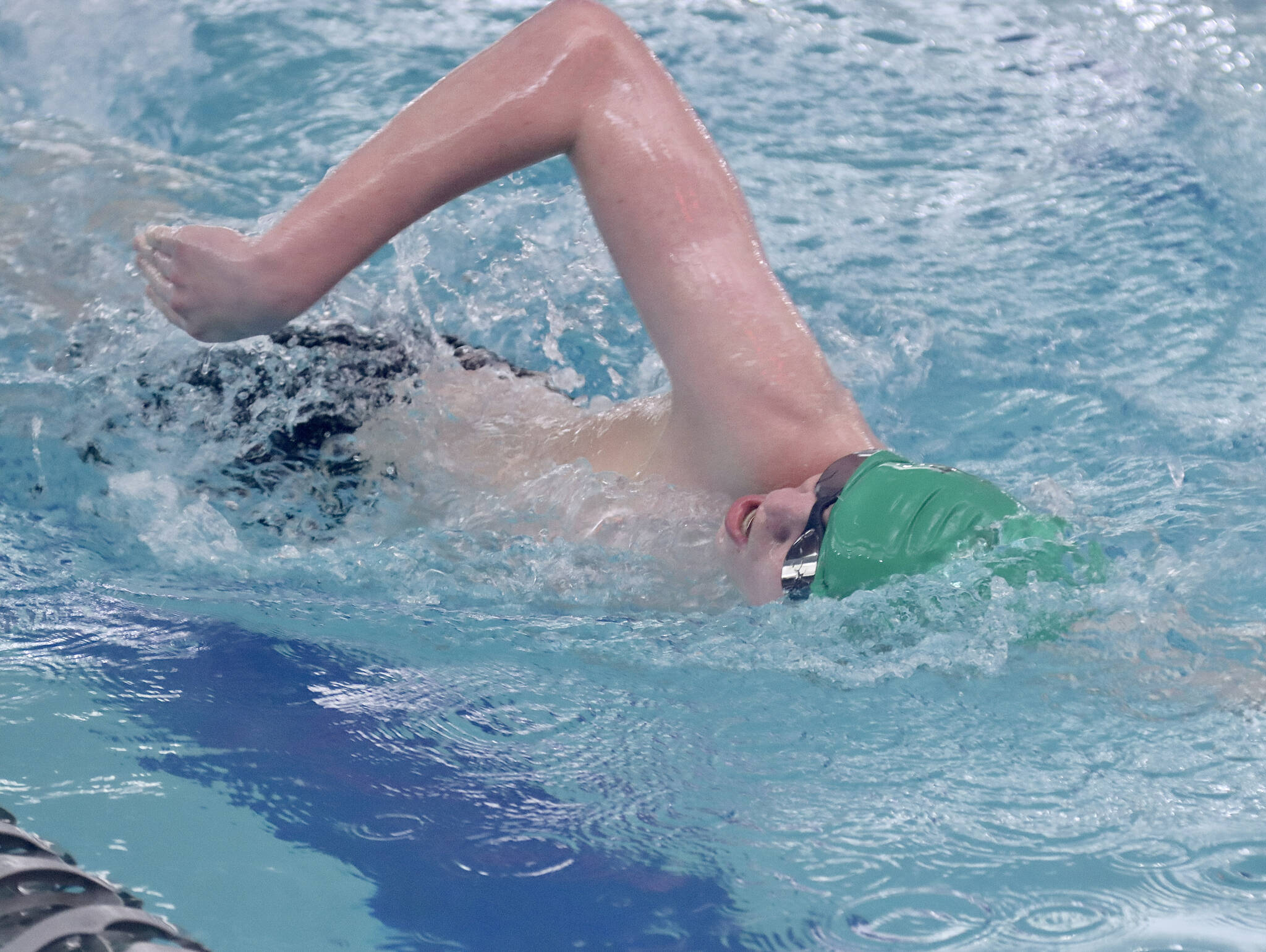 Port Angeles’ Isaac Meek powers to victory in the 200-yard freestyle, setting the first of two new personal bests in the Riders’ swim meet victory over Klahowya at Shore Aquatic Center.