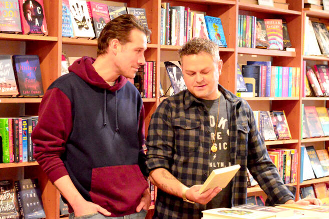 Garrett Jones, left, and John Blomgren plan community events at Port Townsend’s Imprint Bookshop, which they have just purchased. (Diane Urbani de la Paz/for Peninsula Daily News)