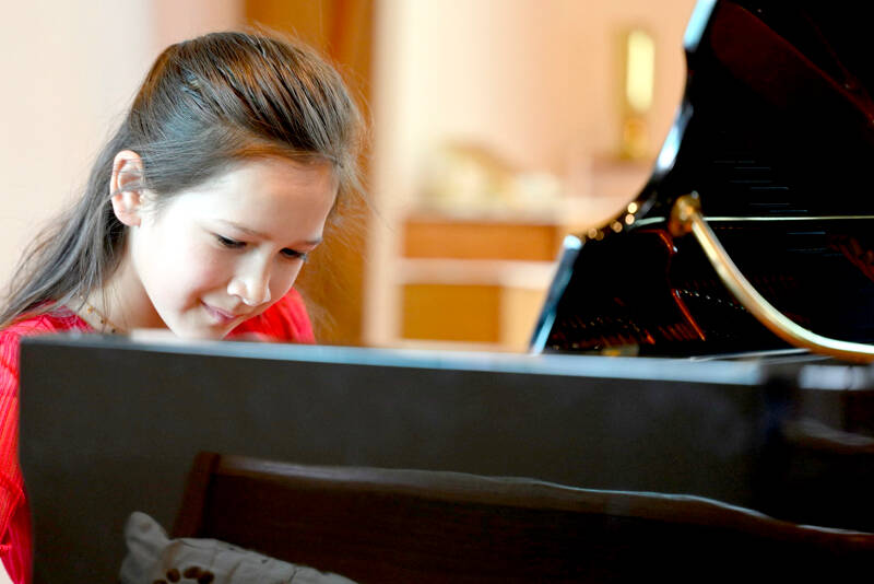 Annaleigh Harrison plays piano in last year’s PTSO Young Artist Competition. (Karl Perry)