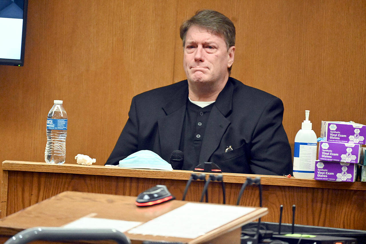 Dennis Bauer gets emotional while testifying at his triple murder trial in January 2022. His conviction was overturned by the state Court of Appeals and remanded back to Clallam County. (Paul Gottlieb/Peninsula Daily News)