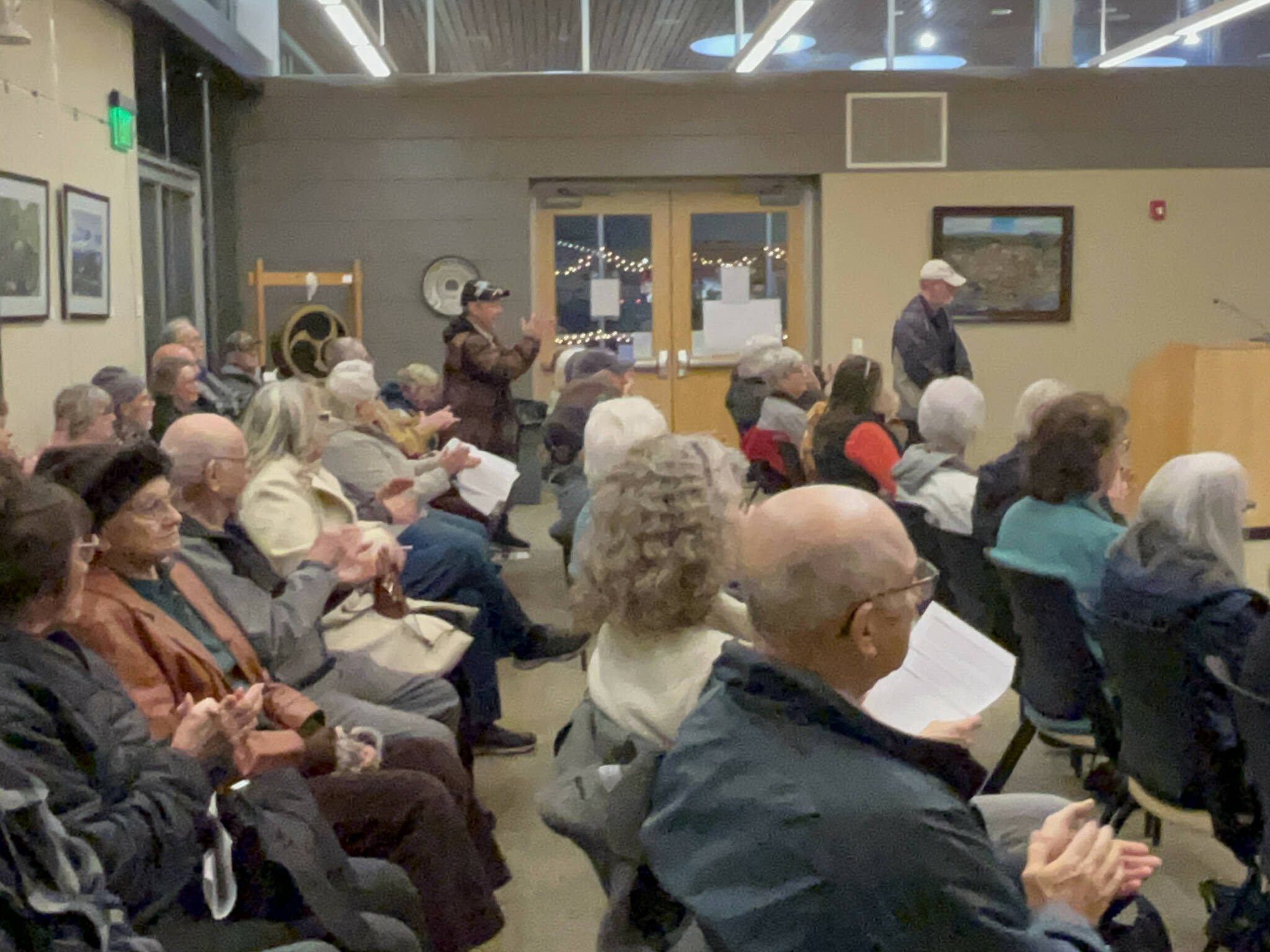 Residents of various manufactured home parks applaud the Sequim City Council’s decision on Dec. 9 to approve a new overlay that preserves manufactured home parks so that they cannot be redeveloped for other uses. (Matthew Nash/Olympic Peninsula News Group)