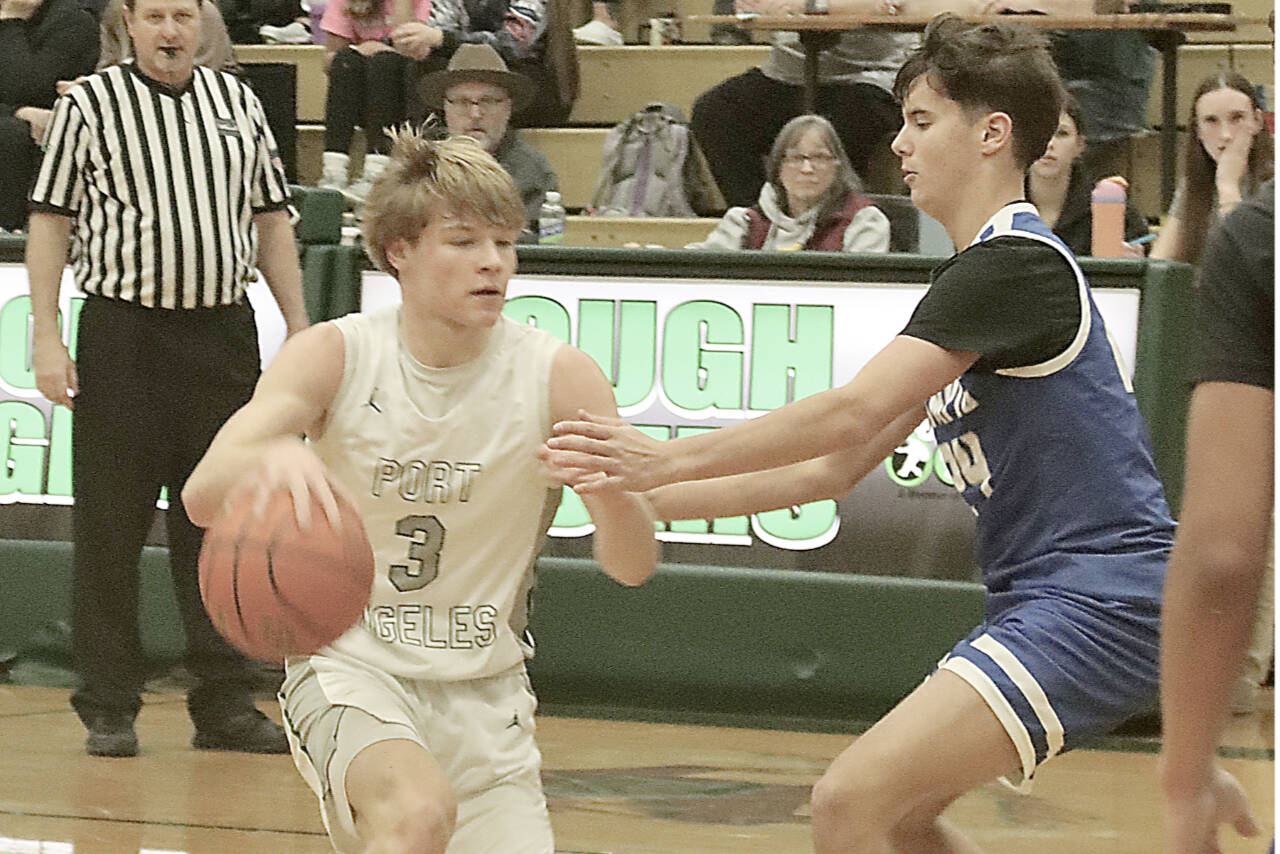 Port Angeles’ Gus Halberg, here playing against Olympic earlier this month, scored 37 points against W.F. West on Saturday. (Dave Logan/for Peninsula Daily News)