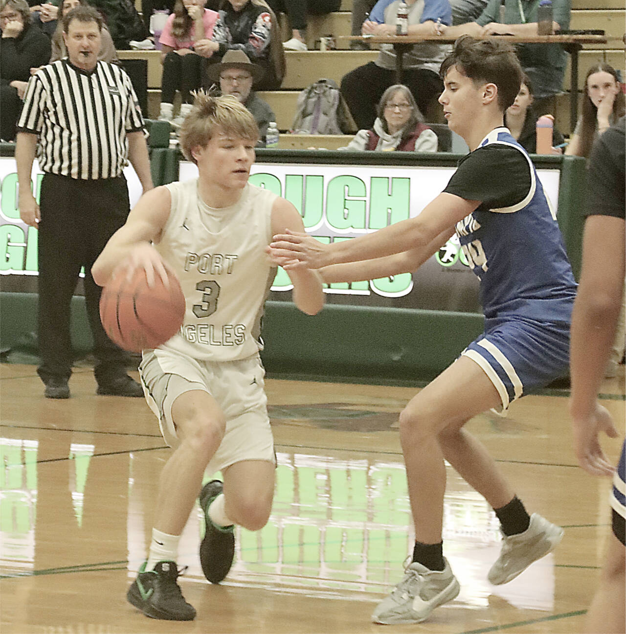 Port Angeles’ Gus Halberg, here playing against Olympic earlier this month, scored 37 points against W.F. West on Saturday. (Dave Logan/for Peninsula Daily News)