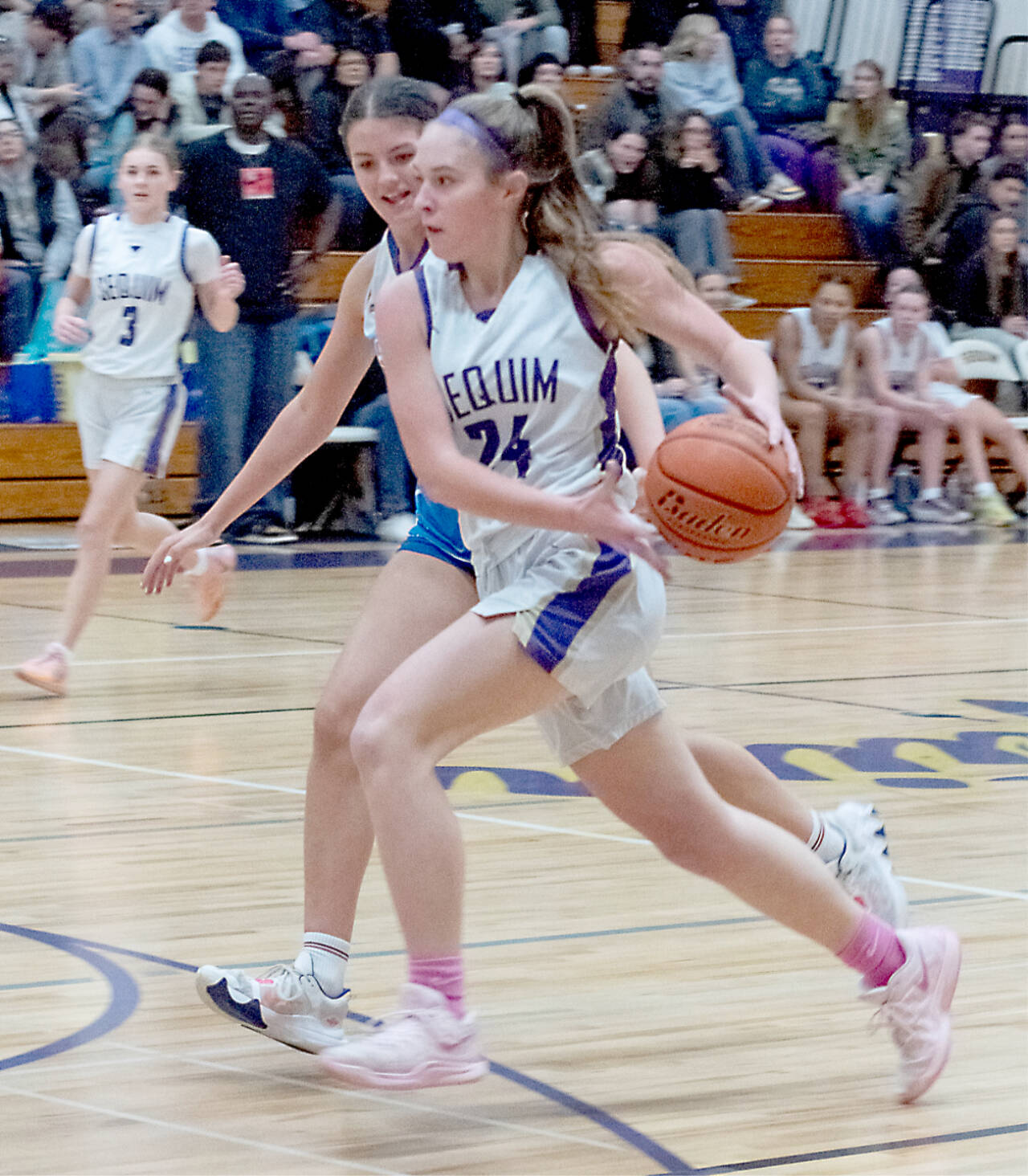 Sequim’s Hailey Wagner drives against Bellarine Select, a team from outside of Melbourne, Australia, on Monday in Sequim. Wagner had nine rebounds as Sequim played the Australians tough in a 54-52 loss. (Emily Matthiessen/Olympic Peninsula News Group)