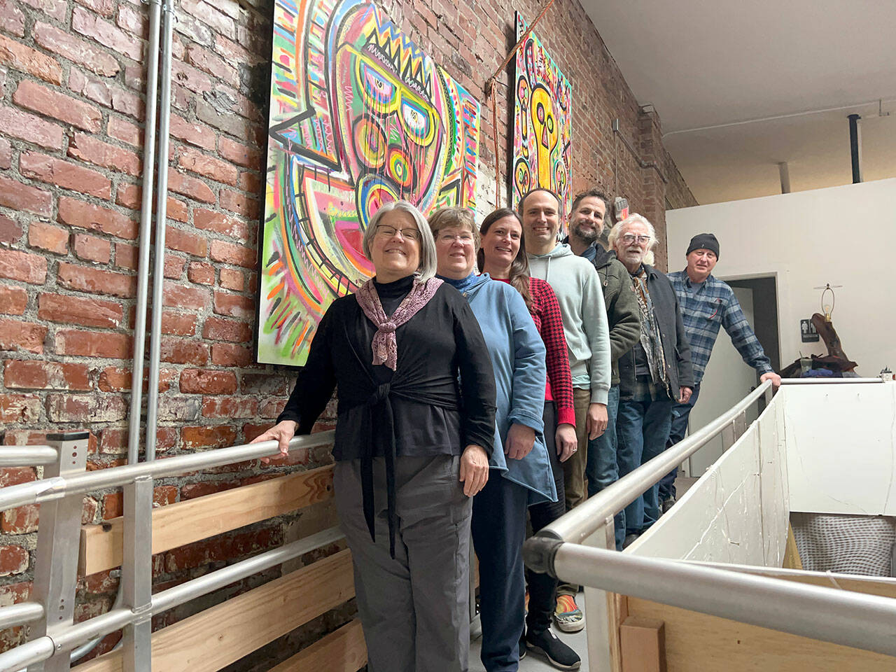 The Port Angeles Arts Council, from left, MarySue French, Beth Witters, Roxanne Greeson, Kyle Zimmerman, Chris Allen, Bob Stokes and Todd Fischer, will host an open house on Wednesday.