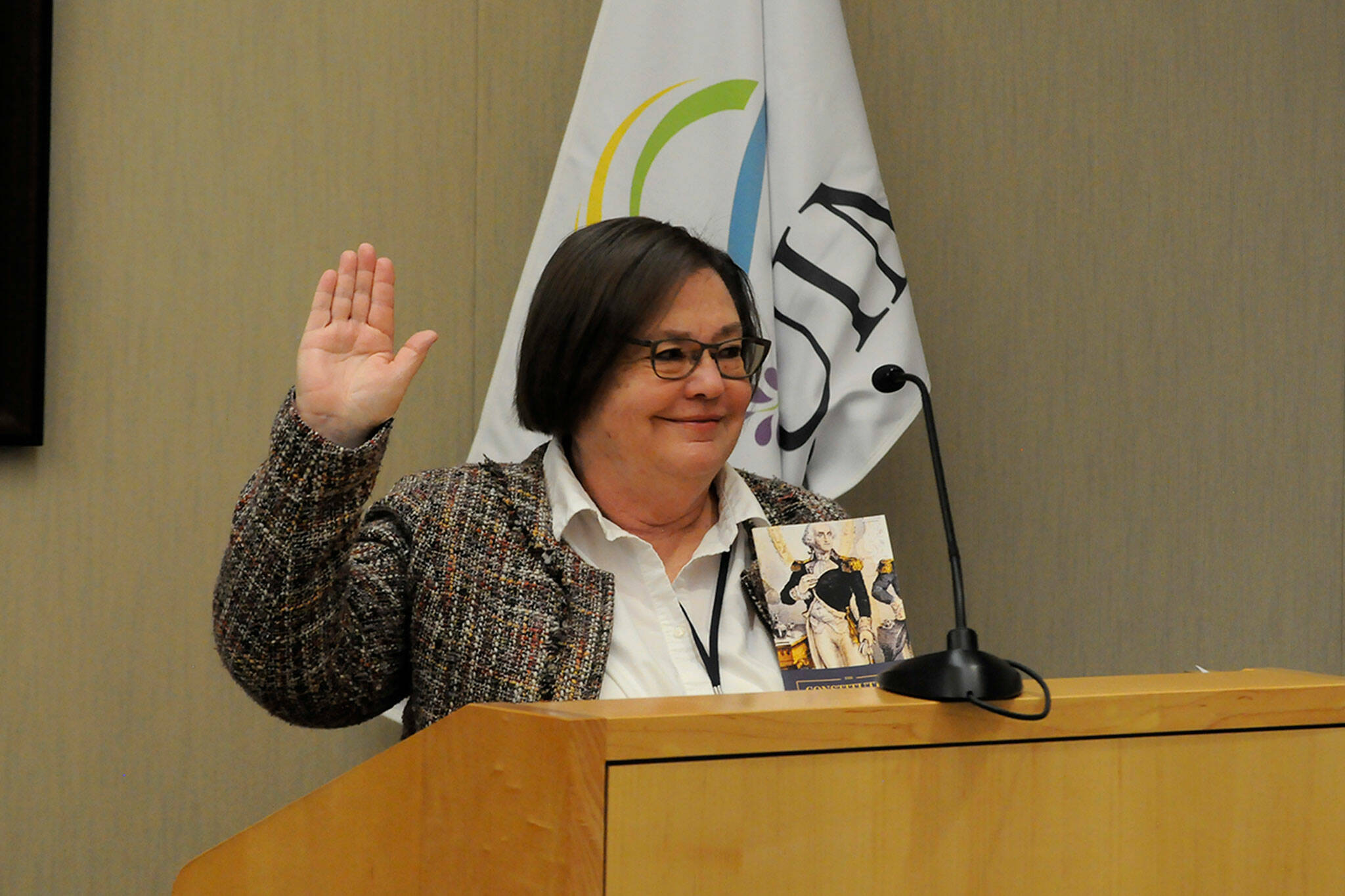 Kathy Downer takes the oath office for Sequim City Council seat No. 1 on Jan. 8, 2024, in the council chambers. She plans to resign from council this month after three-plus years to spend time with family. (Matthew Nash/Olympic Peninsula News Group file)