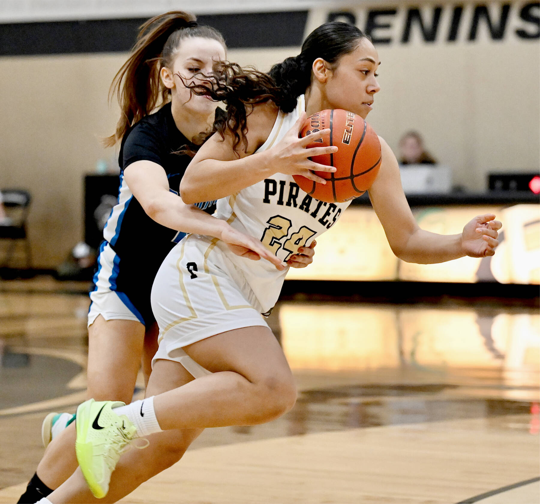 Photos by Jay Cline/Peninsula College
Peninsula College’s Shania Moananu (24) drives past the defense of an Edmonds player Saturday in Port Angeles. Peninsula won 87-59 to improve to 11-2 on the season.