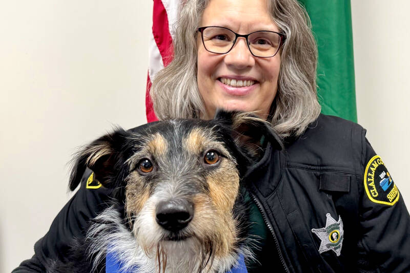 Chaplain Kathi Gregoire poses with Scout, her 4-year-old mixed breed dog. Scout is training to be a therapy dog to join Gregoire on future community calls with either the Clallam County Sheriff’s Office or the Washington State Patrol. (Clallam County Sheriff’s Office)