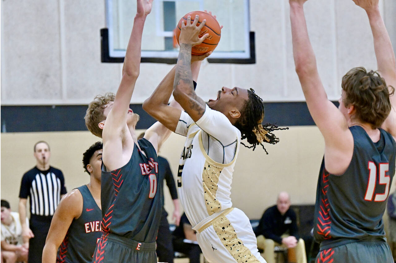 Peninsula College's Cinco McNeal goes up for a basket against Everett on Saturday. In a game with 21 lead changes, the Pirates hung on to win 73-68. (Jay Cline/Peninsula College)