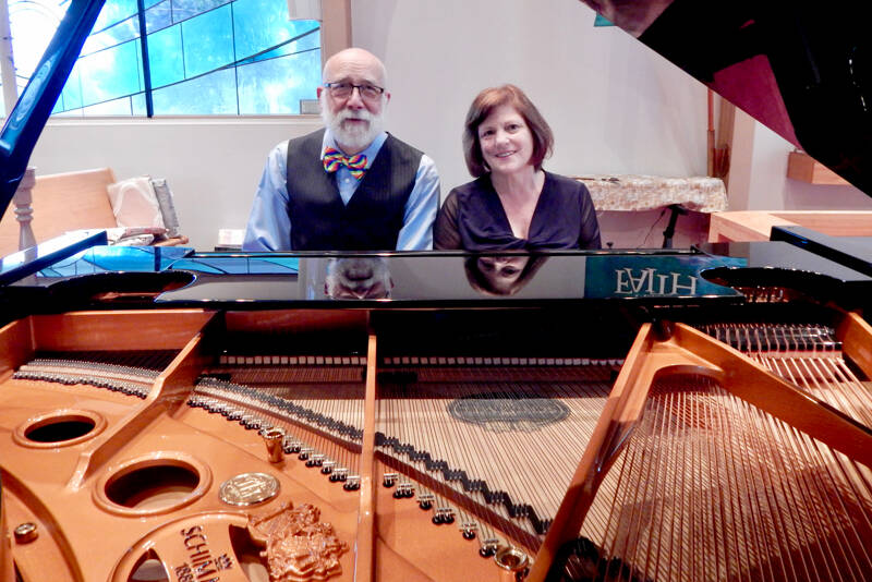 Michael Carroll, pianist and co-artistic director, and Lisa Lanza, pianist and a founding member of the Port Townsend Symphony Orchestra Chamber Music Series, take a break from practice. (Port Townsend Symphony Orchestra)