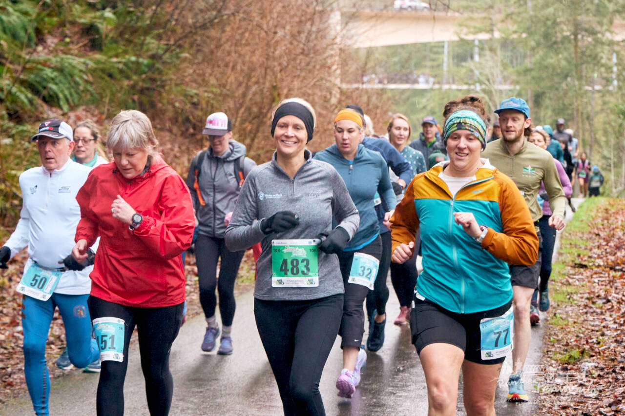 Participants run along the Olympic Discovery Trail in the 2024 Elwha Bridge run just west of Port Angeles. (Run the Peninsula)